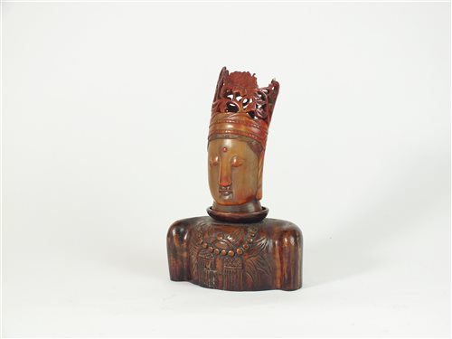 Lot 292 - A Chinese carved rosewood and buffalo horn bust of Guanyin