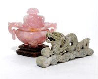 Lot 333 - A Chinese rose quartz covered tripod censer