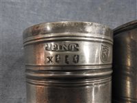 Lot 136 - A large collection of 15 assorted pewter measures