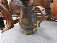 Lot 749 - A collection of pewter drinking vessels and measures etc