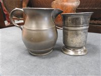 Lot 147 - A collection of twelve 18th and 19th century pewter mugs and measures