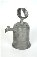 Lot 165 - A mid 18th century Swiss bell shaped pewter wine can or glockenkanne