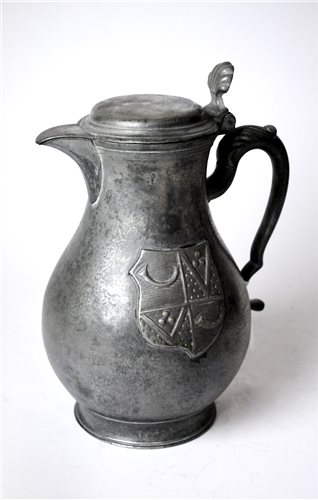 Lot 738 - A Continental 18th century pewter flagon