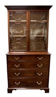 Lot 778 - A George III mahogany cabinet bookcase