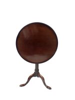 Lot 961 - A 20th century mahogany snap top tripod table