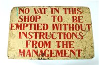 Lot 557 - An Edwardian hand painted enamel shop sign