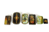 Lot 184 - A small collection of papier mache snuff boxes