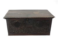 Lot 698 - An early 18th century or earlier oak plank chest or bible box