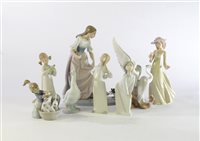 Lot 97 - Eight pieces of Nao and Lladro