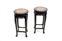 Lot 361 - A pair of Chinese rosewood and marble inset urn stands