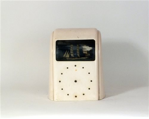 Lot 490 - An Art Deco pink bakelite Vitascope automata clock
