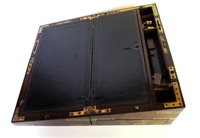 Lot 568 - A mahogany and brass bound campaign desk