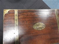 Lot 568 - A mahogany and brass bound campaign desk
