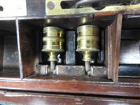 Lot 568 - A mahogany and brass bound campaign desk