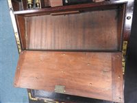 Lot 568 - A mahogany and brass bound campaign desk