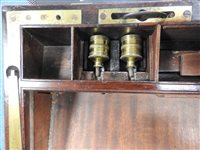 Lot 568 - A mahogany and brass bound campaign desk
