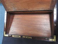 Lot 568 - A mahogany and brass bound campaign desk
