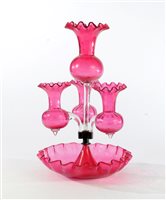 Lot 199 - A Victorian cranberry glass epergne