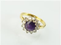 Lot 183 - An amethyst and diamond cluster ring