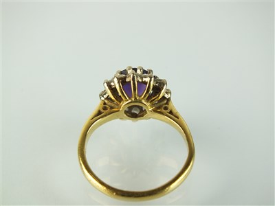 Lot 183 - An amethyst and diamond cluster ring