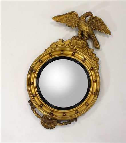 Lot 704 - A mid-19th century convex circular wall mirror