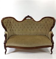 Lot 748 - A large Victorian walnut framed upholstered settee