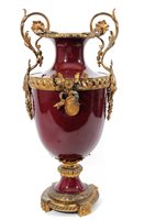 Lot 375 - A French ormolu mounted two handled sang de boeuf vase