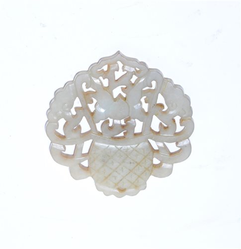 Lot 262 - A Chinese pale green jade openwork plaque