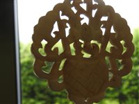 Lot 262 - A Chinese pale green jade openwork plaque