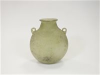 Lot 186 - A Roman-glass style green moon flask