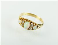 Lot 209 - An opal and diamond ring