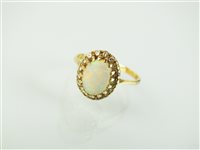 Lot 177 - An opal and diamond cluster ring