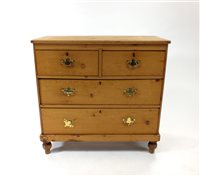 Lot 790 - A pale stripped pine chest of two short drawers