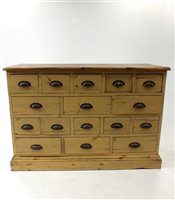 Lot 794 - A painted pale pine bank of 16 drawers