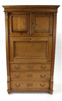 Lot 785 - A large pale stripped pine hall cupboard