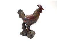 Lot 797 - A large novelty carved and painted hardwood storage vessel in the form of a standing cockerel