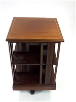 Lot 700 - A large Edwardian mahogany floor standing revolving bookcase