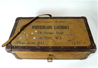 Lot 633 - An early 20th century bound plywood laundry case