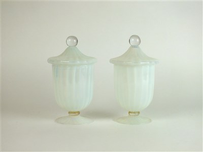 Lot 265 - A pair of vaseline glass jar and covers attributed to Boston Sandwich glassworks