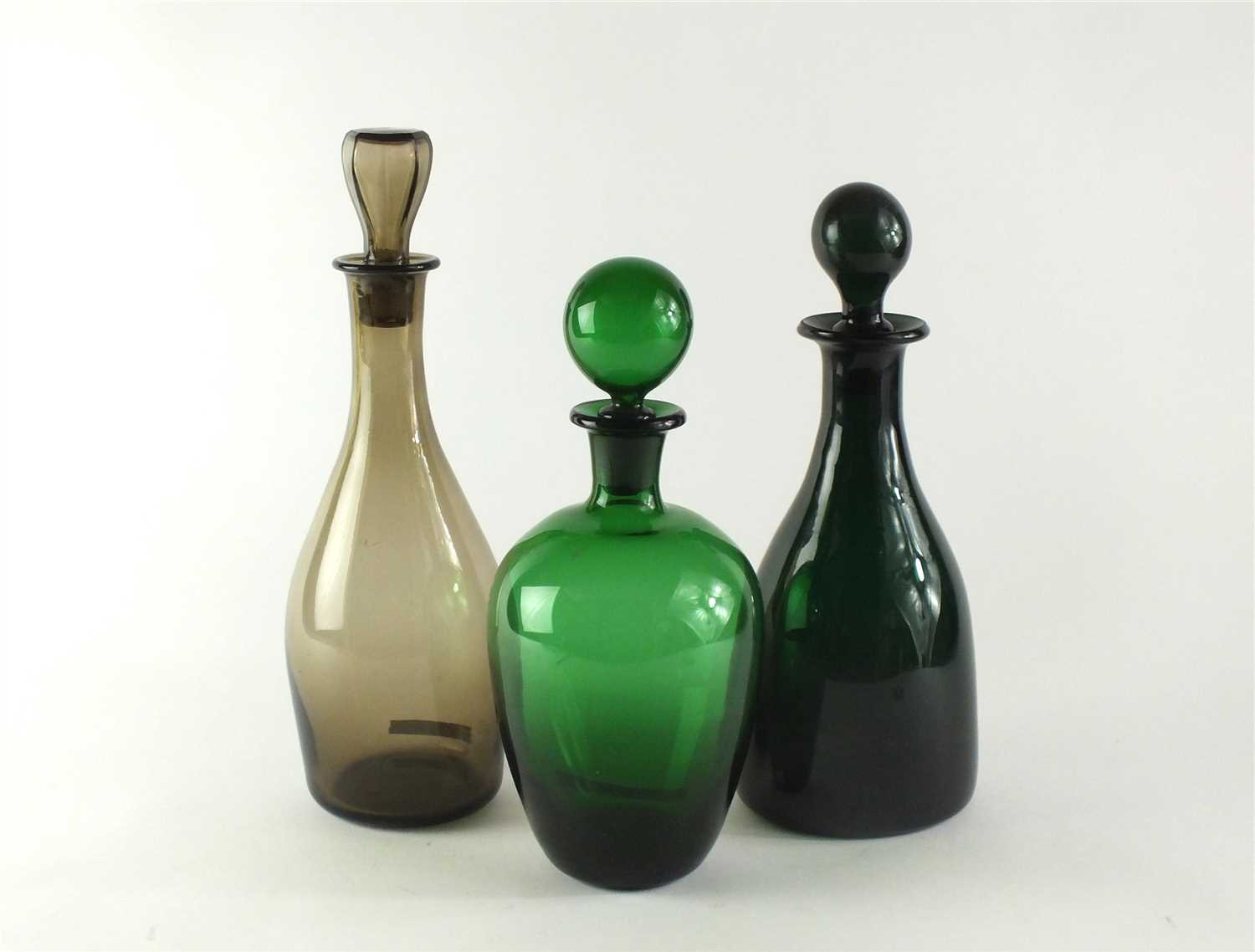 Lot 120 - Three glass decanters and stoppers