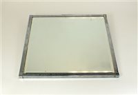 Lot 977 - An Art Deco period chrome framed wall mirror