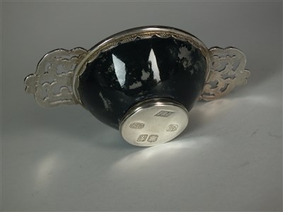Lot 50 - A silver mounted agate quaich