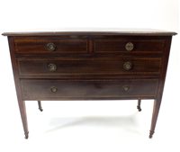 Lot 521 - An Edwardian mahogany chest of two long and two short drawers