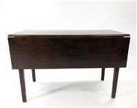 Lot 729 - An oak drop-leaf dining table, raised on square legs