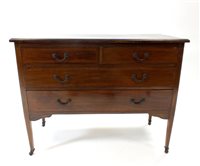 Lot 522 - An Edwardian mahogany chest of two short and two long drawers