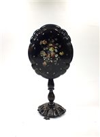 Lot 776 - A Victorian black lacquered papier mâché snap-top occasional table