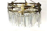 Lot 641 - A ceiling hanging four-tier drop chandelier