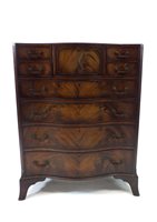 Lot 771 - A good quality reproduction serpentine mahogany chest of drawers