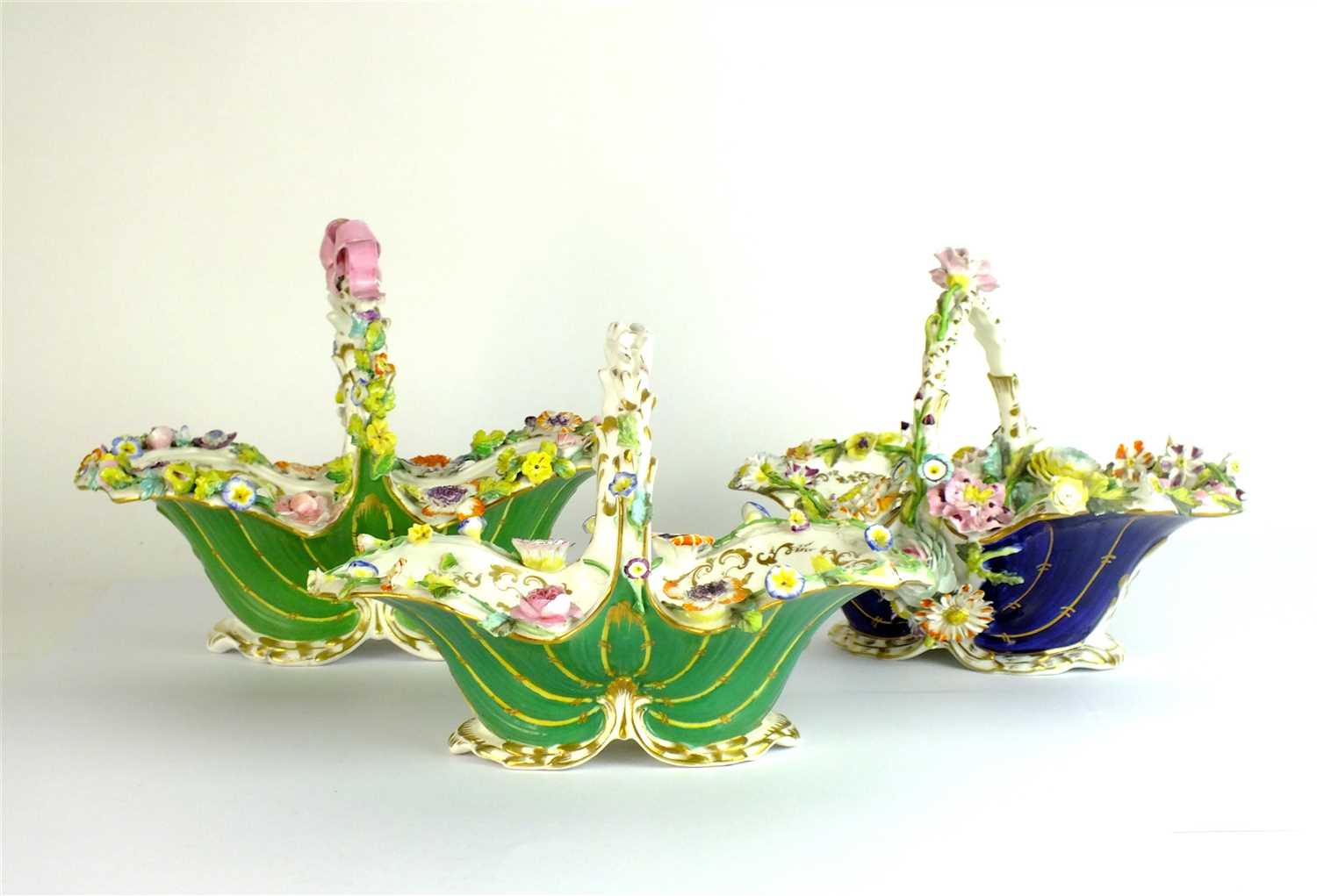 Lot 378 - Three Coalbrookdale porcelain floral-encrusted baskets