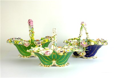 Lot 378 - Three Coalbrookdale porcelain floral-encrusted baskets